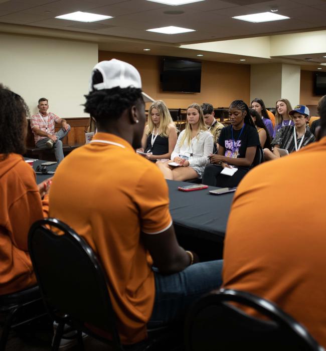Texas high school students interview UT Austin athletes.